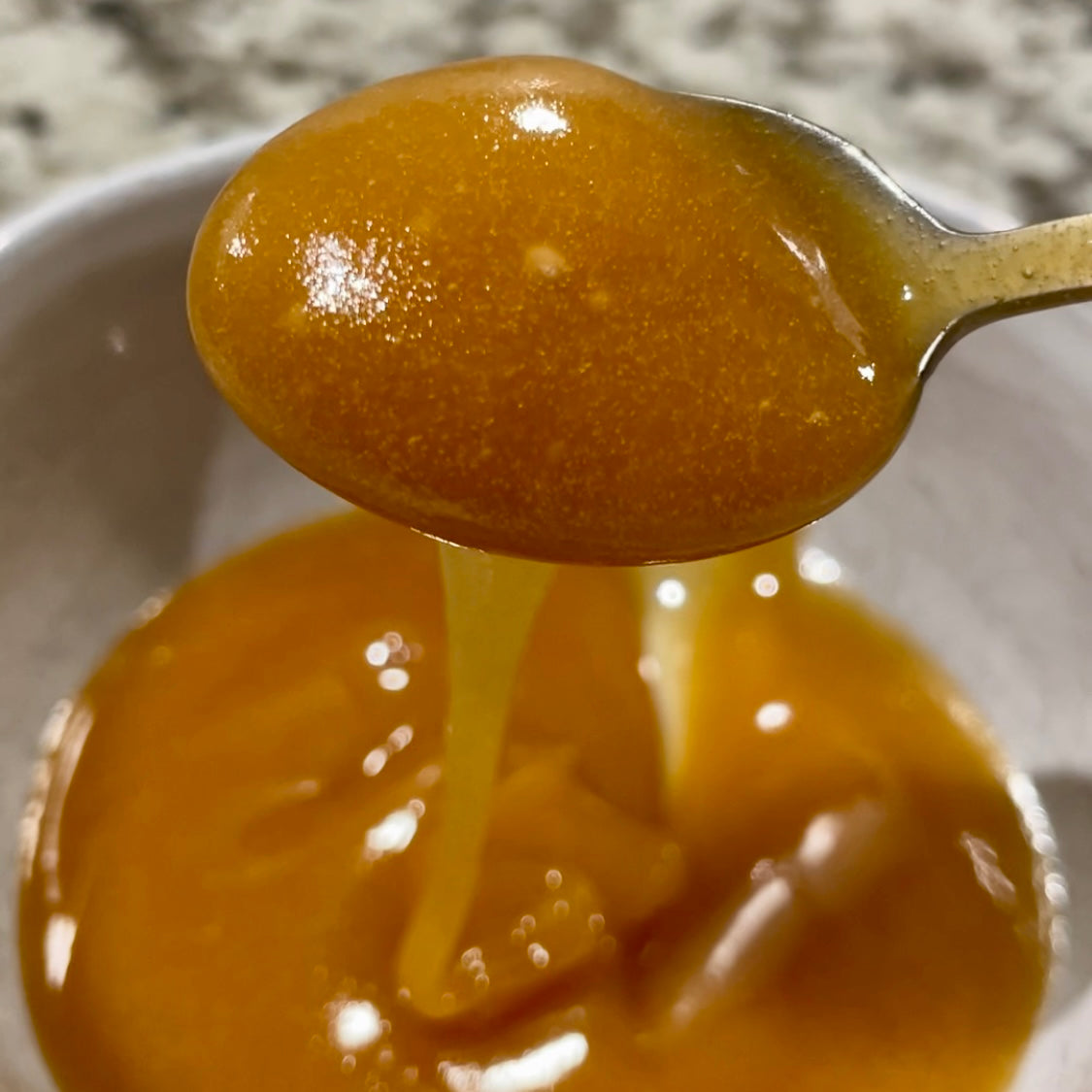 Manuka honey on a spoon